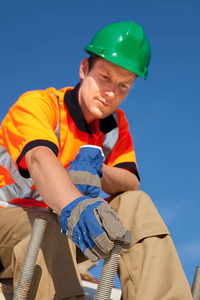istock Manual worker busy with road construction. Building a bridge. 184279584