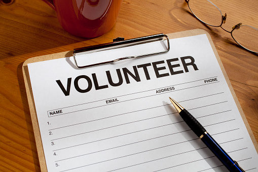 Blank Volunteer sign up sheet on a desktop.