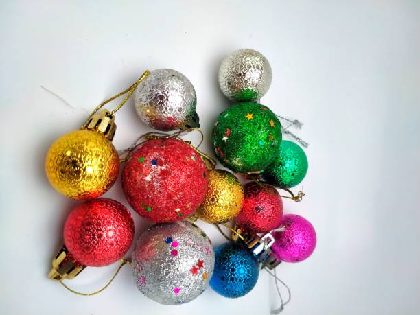 istock Colorful balls of Christmas decorations on a white background 1842805513