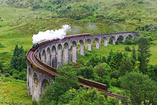 The steam locomotive on the famous Glenfinnan Viaduct in Scotland