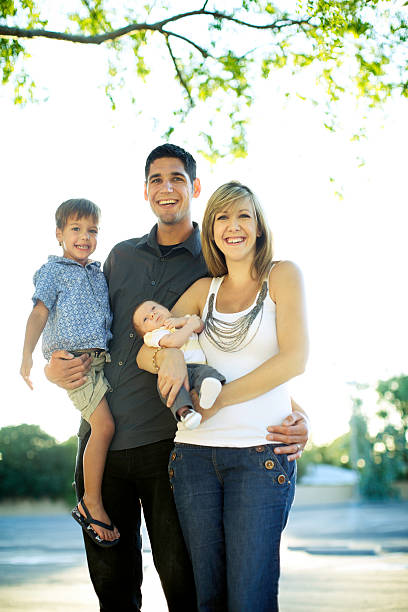 istock Family Outdoors on Warm Summer Day 184281370