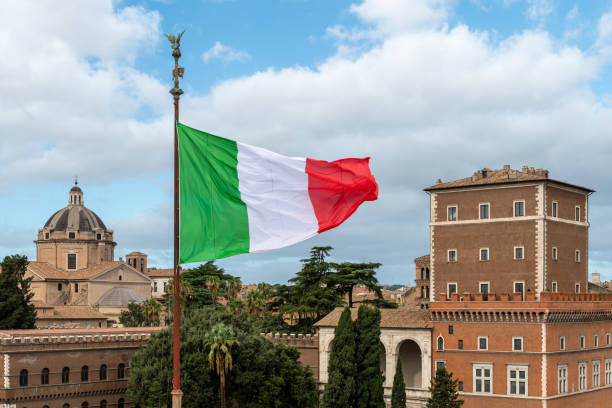 istock Italian flag with buildings in Rome 1842814848