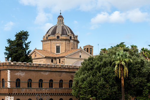 View of the Church of Santa Maria di Loreto, on the left and behind, almost identical, the Church of the Most Holy Name of Mary at the Roman Forum