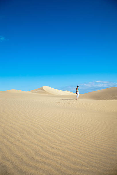 istock Woman in the desert 184281887