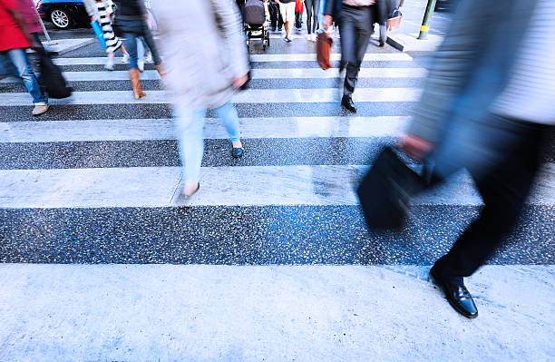 istock People crossing street, motion blur 184281893