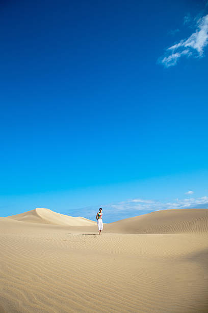 istock Woman in the desert 184282008
