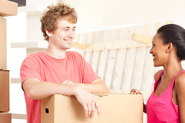 istock Young couple moving house. 184282770