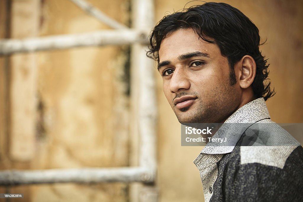 Indian Tourist "A young Indian man poses at the Amber Fort in Jaipur, India (filtered). See more -" India Stock Photo