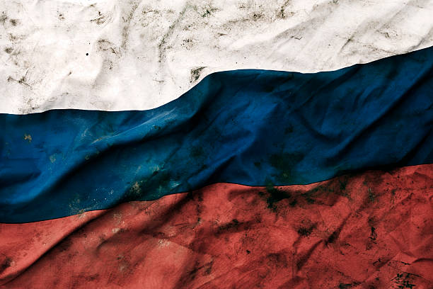 Grungy Russian Republic Flag Low key photography of grungy old flag of Russia. russian flag stock pictures, royalty-free photos & images