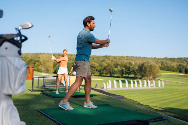 istock Golfing Harmony: Youthful Couple on Course 1842830378