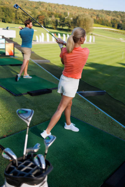 istock Golfing Fun with a Young Couple 1842832271