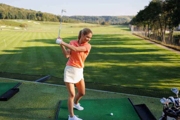 istock Graceful Female Golfer on Fairway 1842833552