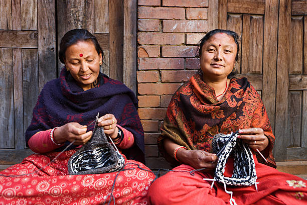 istock Nepali women  kniting wool hat. Bhaktapur. 184283620