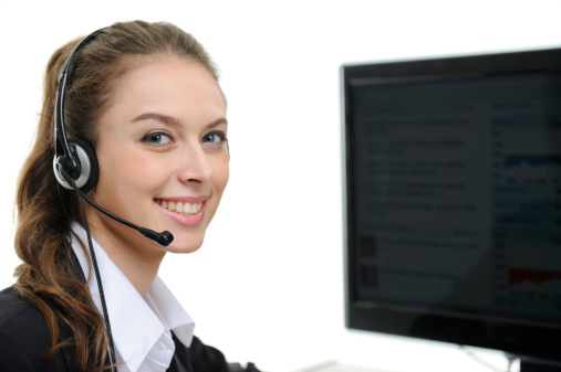 Female doctor and nurse talking in a callcenter