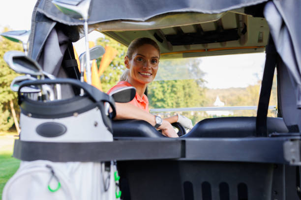 istock Scenic Drive: Woman Enjoying Golf Cart Ride 1842839887