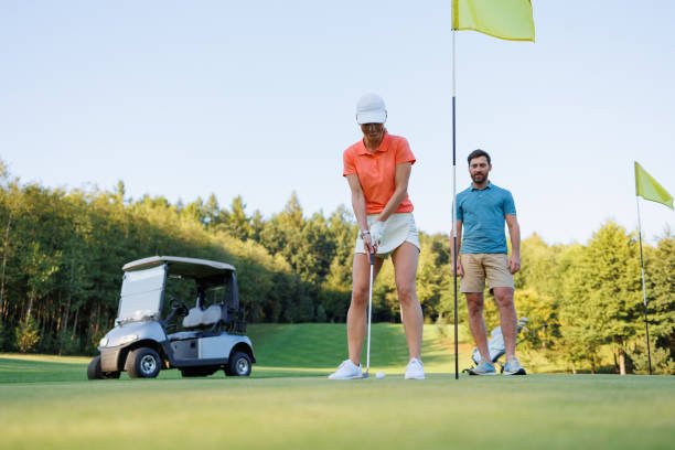 istock Determined Golfer: Young Woman on Last Hole 1842842521