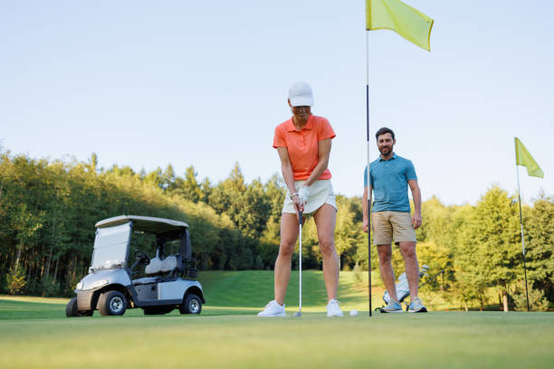 istock Focused Golfer: Woman at Final Golfing Stage 1842842522
