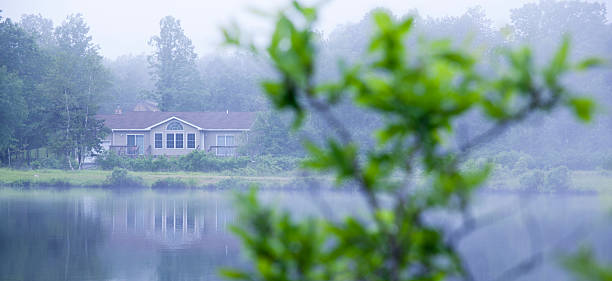 istock House near the lake 184284865
