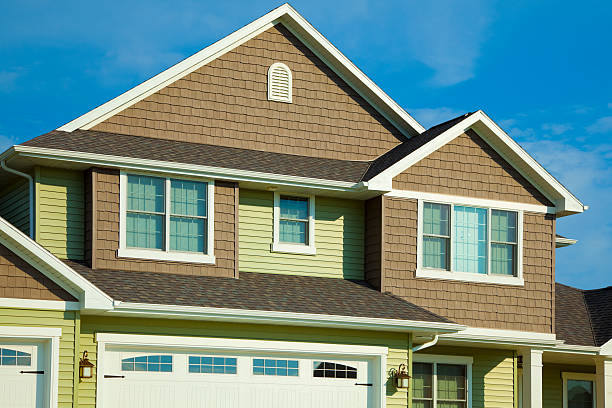 istock Green and Brown House With Cedar, Vinyl Siding 184285137