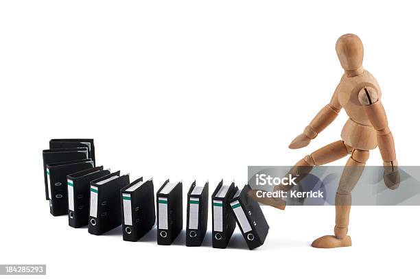 Wooden Mannequin And Domino With Folders Stock Photo - Download Image Now - Artist's Figure, Artist's Model, Boredom
