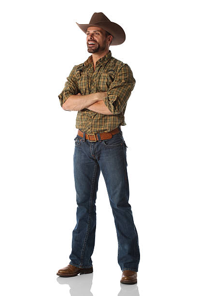 istock Cowboy standing with arms crossed 184285471
