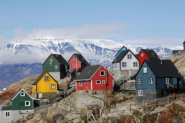 Greenland homes Colourful houses on the island of Uummannaq GreenlandUummannaq is located 590 kilometres north of the Arctic Circle greenland stock pictures, royalty-free photos & images