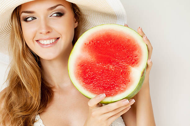 istock Beautiful woman with watermelon 184285810
