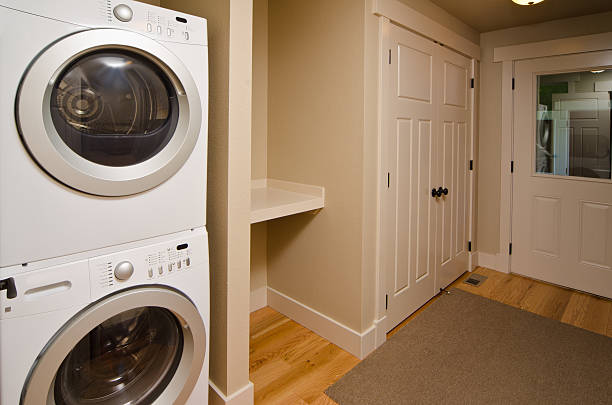istock Laundry room with washer and dryer 184285840