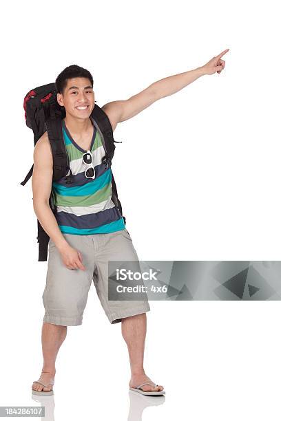 Hiker Pointing With Finger Stock Photo - Download Image Now - Hiking, Asian and Indian Ethnicities, Full Length