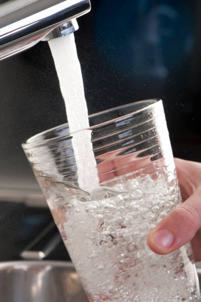 istock Filling up a glass of water 184286218