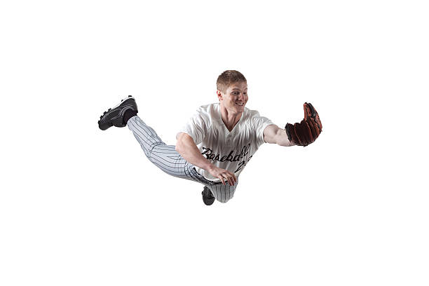 istock Baseball player diving to catch the ball 184286762