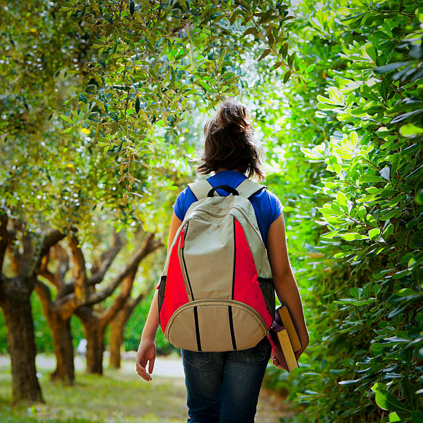 istock Schoolgirl in the park 184286818