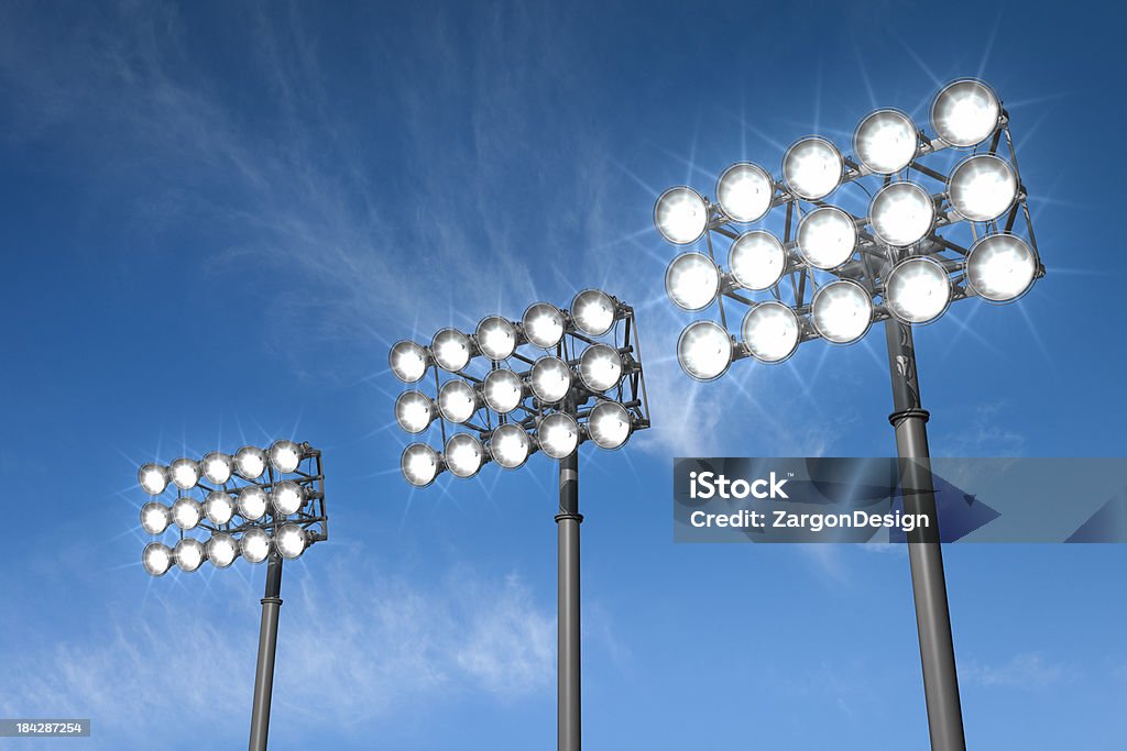 Stadium Lights Large stadium lights on a sky background.Could be a useful element in a sports composition.This is a detailed 3d rendering. Floodlight Stock Photo