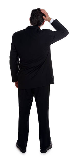 Businessman Scratching the Back of his Head