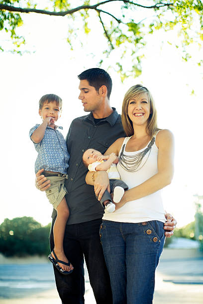istock Family Outdoors on Warm Summer Day 184288054
