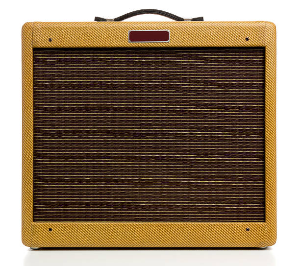 guitar amplifier with jack cable isolated on white background
