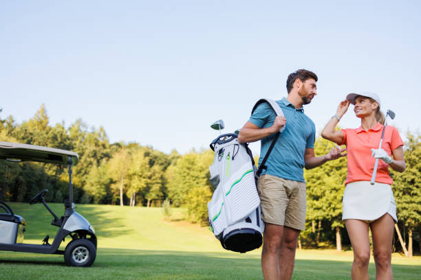 istock Golf Enthusiasts: Couple Enjoying Leisure Time on Course 1842884410