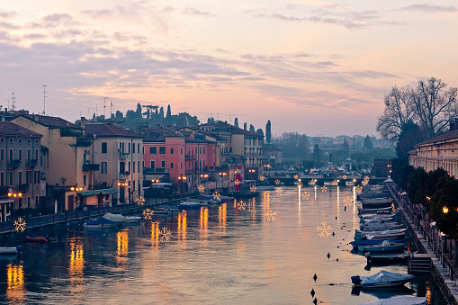 Christmas decorations in Peschiera del Garda. Lake Garda, Italy. Canon EOS 5D Mark II -orange toned lights-