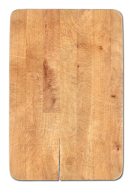wooden bread cutting board isolated on white, knife's cuts visible - 砧板 個照片及圖片檔