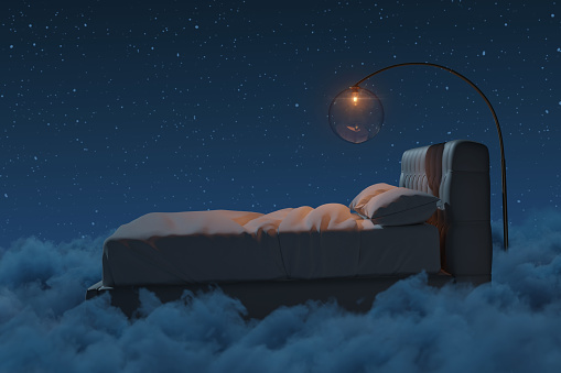3d rendering of cozy bed with hanging illuminated lamp over fluffy clouds at night