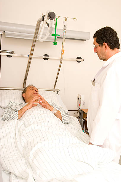 istock Doctor's Visit in the Hospital Ward 184289839