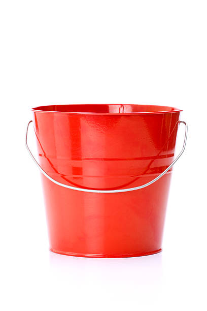 Red metal bucket with aluminum close-up of red bucket isolated on white background bucket stock pictures, royalty-free photos & images