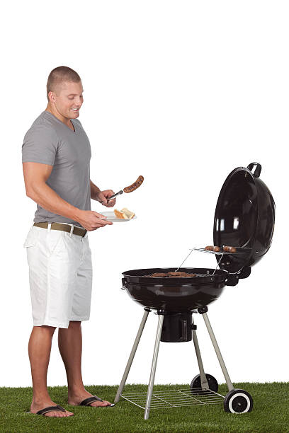 istock Man putting food on a plate 184290419