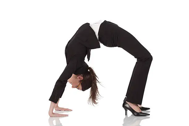 Photo of Businesswoman practicing yoga