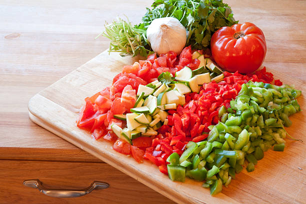 istock Chopped Vegetables lined up on a cutting board 184290566