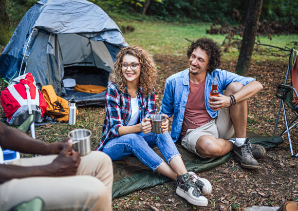 istock Friends camping in the forest together 1842906850