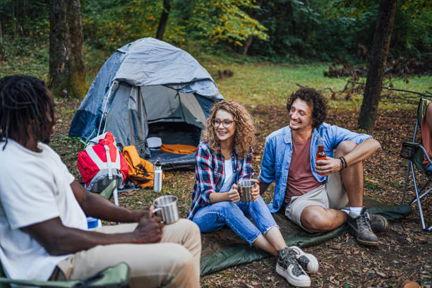 istock Friends camping in the forest together 1842908955