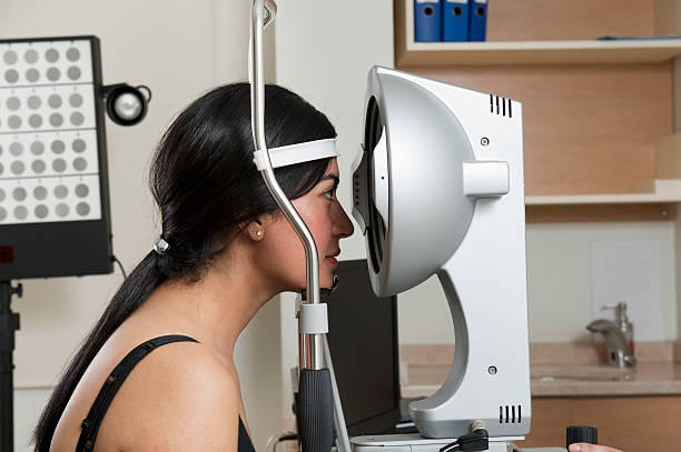 istock Woman eye exam 184291155