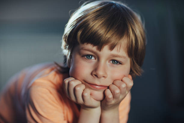 istock Portrait of cute thoughtful boy 1842912562