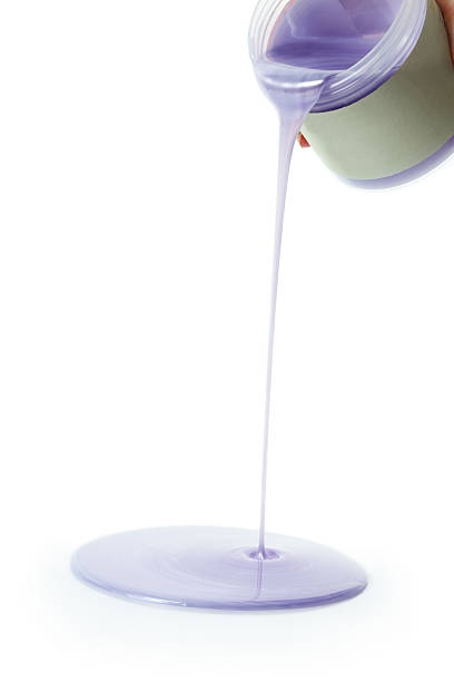 istock Heated lavander wax poured from bottle 184292075